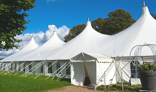 high-quality portable toilets stationed at a wedding, meeting the needs of guests throughout the outdoor reception in Hazlet